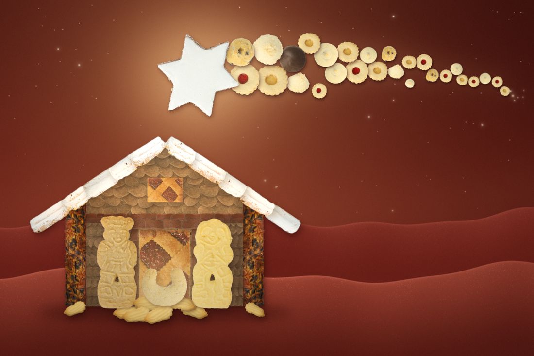 Krippe aus Weihnachtsgebäck: Josef und Maria aus Spekulatius, das Christkind als Vanillekipferl, darüber ein Zimtstern mit einem Schweif aus Plätzchen